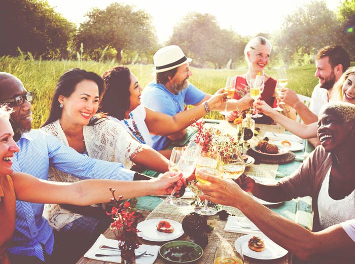 Guests gathering at adjacent cabins along Highway 542